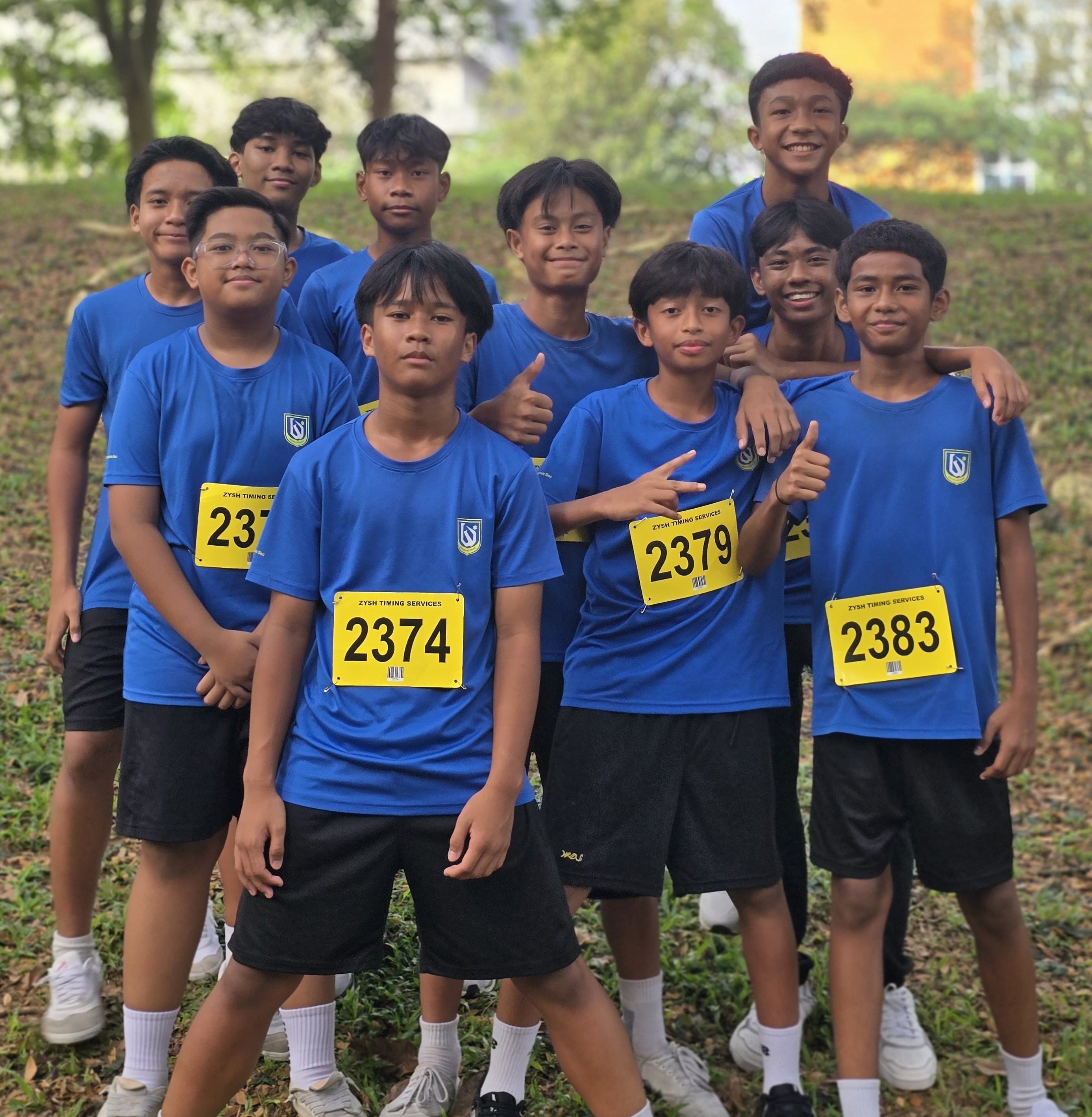Group of happy students at school event